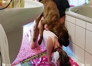 Pasty lady rubbing her clit during doggystyle fucking with a kinky dog